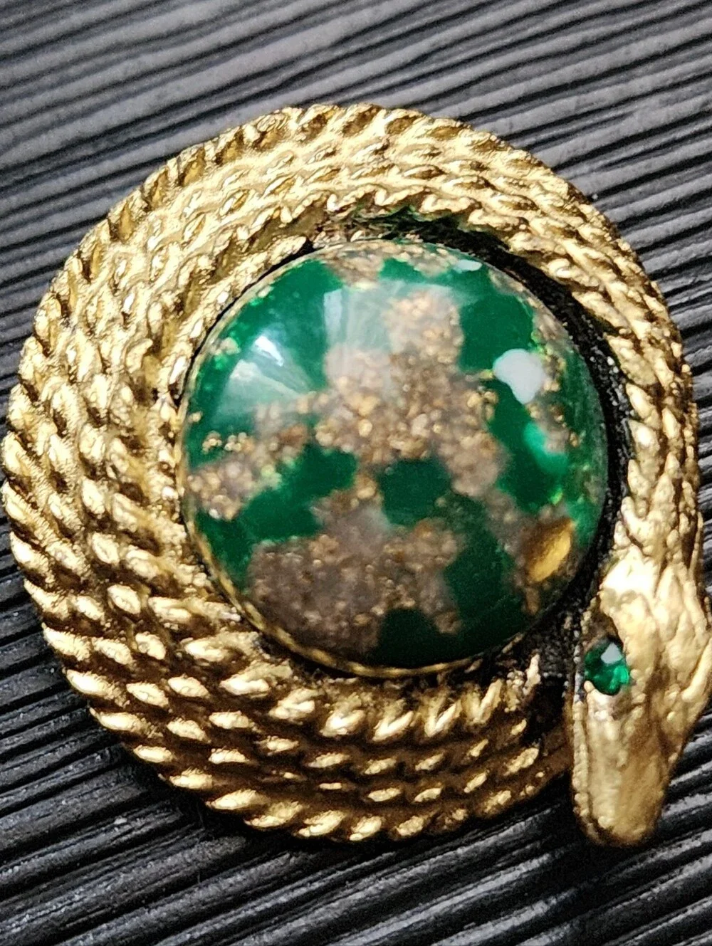 N/A brooch features